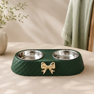Green raised double cat bowl with decorative gold bow detail