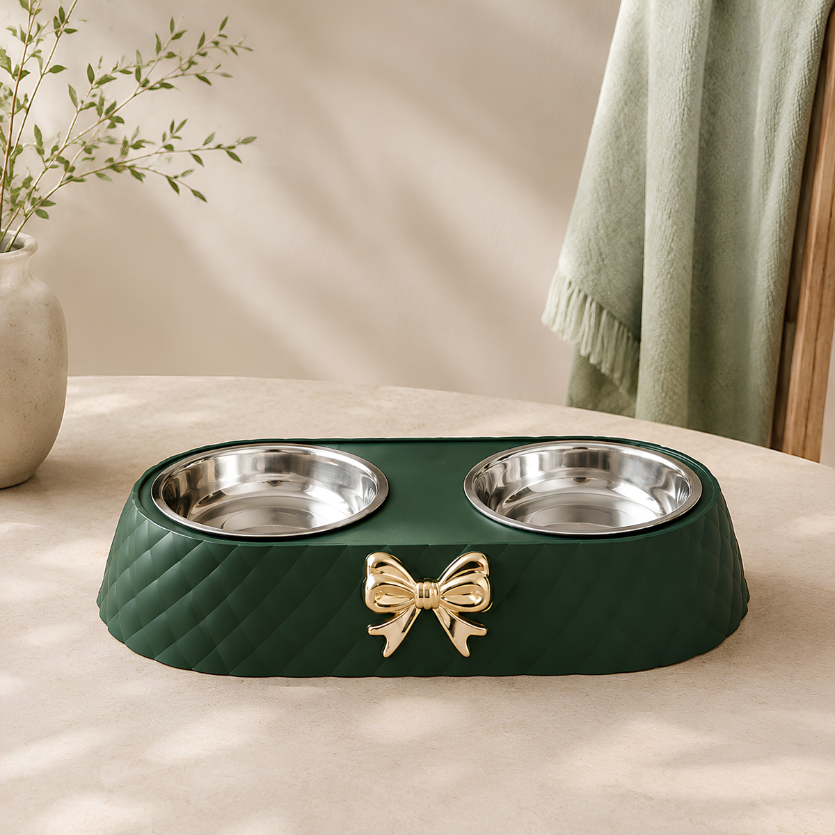 Green raised double cat bowl with decorative gold bow detail